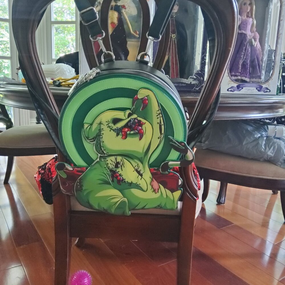 NIGHTMARE BEFORE CHRISTMAS OOGIE BOOGIE GLOWS BACKPACK RETIRED NWT - Picture 8 of 12